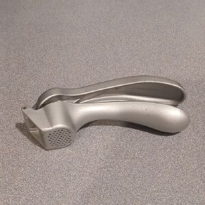 The Pampeted Chef Garlic Press